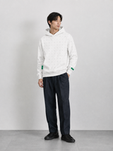Model wearing a white Bay or Bust OpenAI signature hoodie in a product lifestyle setting