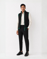 Model wearing a black Bay or Bust OpenAI signature vest, front view for the IPO Collection